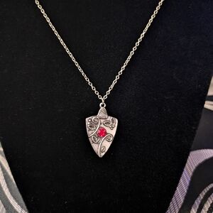 Elegant Silver Pendant Necklace with Red Gemstone